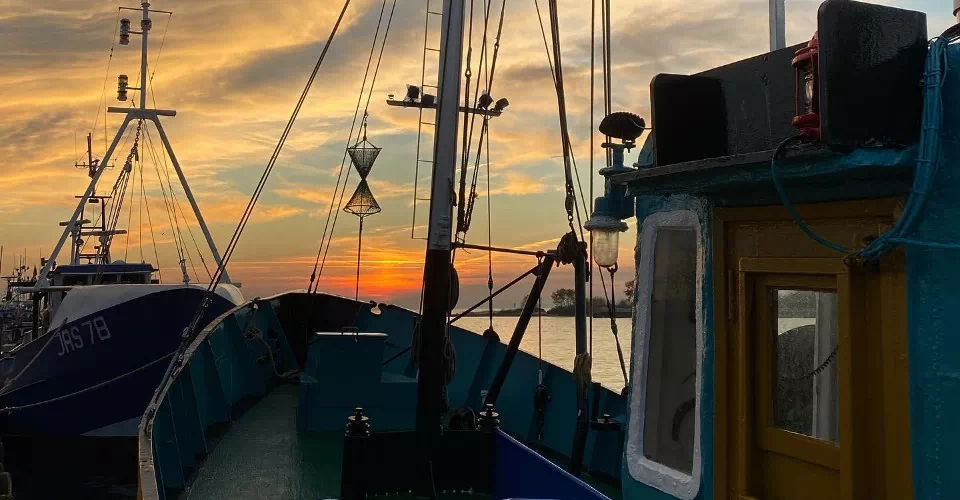 Zachód słońca na łódce